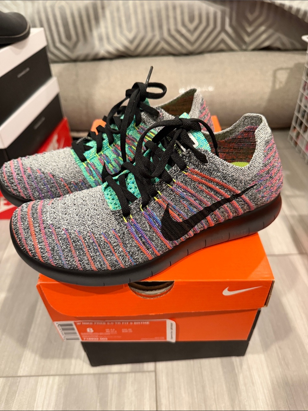 Nike Multicolor Flyknit Running Shoes with Black Swoosh